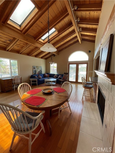 Gorgeous Opened Beamed Ceilings with Skylights. West Facing Balcony off of Great Room.
