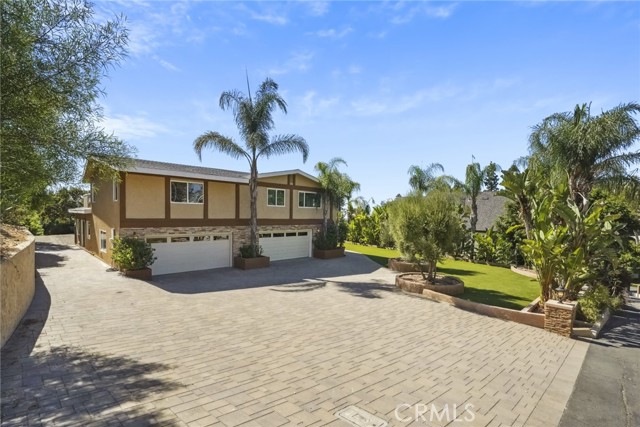 Welcome to this stunning single-family home located at 473 S Country Hill Rd, Anaheim, CA. Built in 1969, this three-story home boasts 4,128 sq.ft. of finished living space on a generous lot size of 29,700 sq.ft. Upon entering, you are greeted by a spacious and inviting floor plan that is perfect for entertaining guests or relaxing with family. The main level features a large living room, dining area, and a well-appointed kitchen with modern appliances and plenty of counter space for meal preparation. The home offers a total of 3 bathrooms, providing convenience for all family members and guests. Each bathroom is beautifully designed with modern fixtures and finishes. The upper levels of the home feature well-sized bedrooms with ample closet space and natural light. The master suite is a true retreat with a private en-suite bathroom and walk-in closet. Additional features of this home include a cozy fireplace, hardwood floors, and a spacious backyard with endless possibilities for outdoor enjoyment. Located in a desirable neighborhood in Anaheim, this home offers easy access to shopping, dining, entertainment, and top-rated schools. Don't miss the opportunity to make this your dream home!