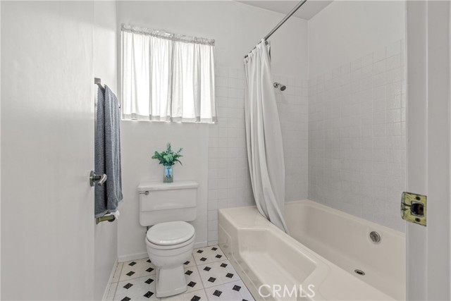 Master bathroom with Shower in tub.