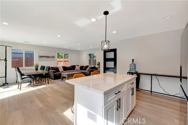 ADU kitchen with quartz countertops and elegant shaker cabinets