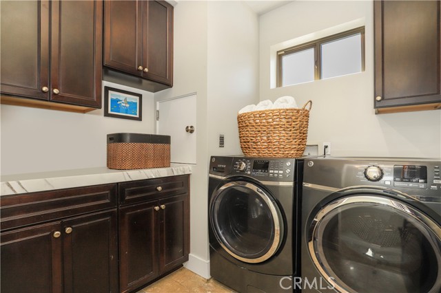 Laundry room conveniently located upstairs between bedrooms.