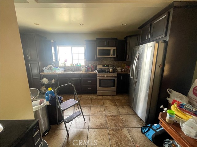 1821 S Curson Avenue, Los Angeles, California 90019, 3 Bedrooms Bedrooms, ,2 BathroomsBathrooms,Residential,For Sale,1821 S Curson Avenue,CRIV25014670