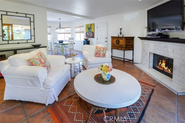 Family room with updated fireplace.