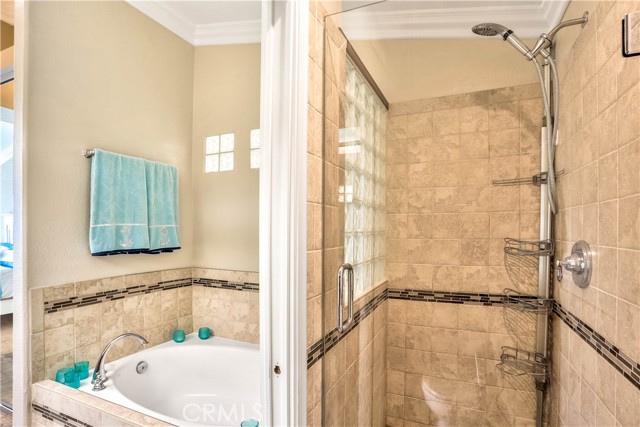 Another view of the remodeled ensuite master bathroom walk in shower and soaking tub.