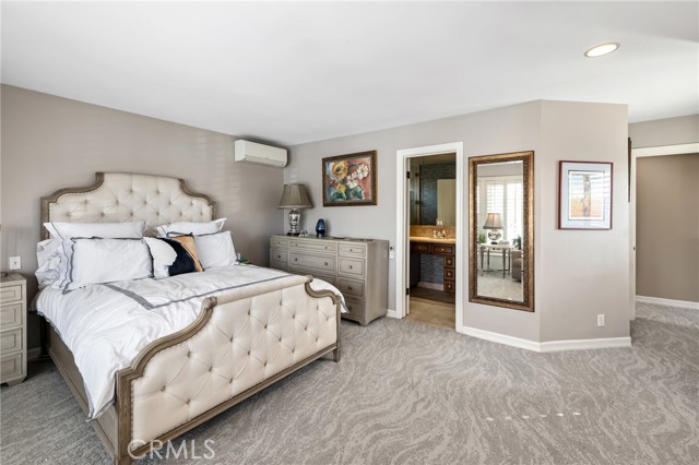 Looking from the bay windows toward the updated 3rd bedroom 3/4 bath.