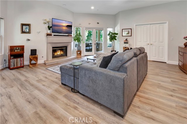 Living room with direct access to patio and rear entrance