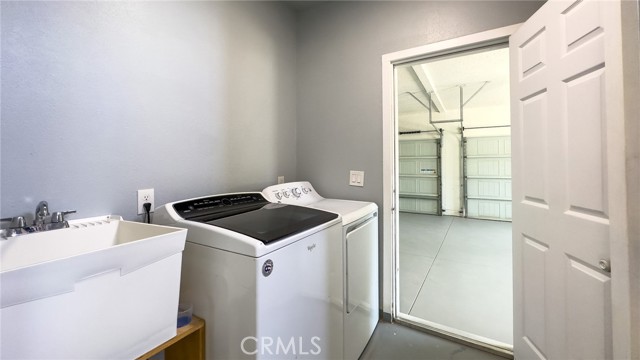 NICE LAUNDRY ROOM WITH SINK.