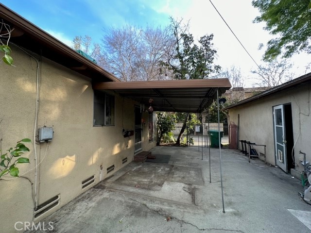 Front House Covered Patio with Studio to the Right