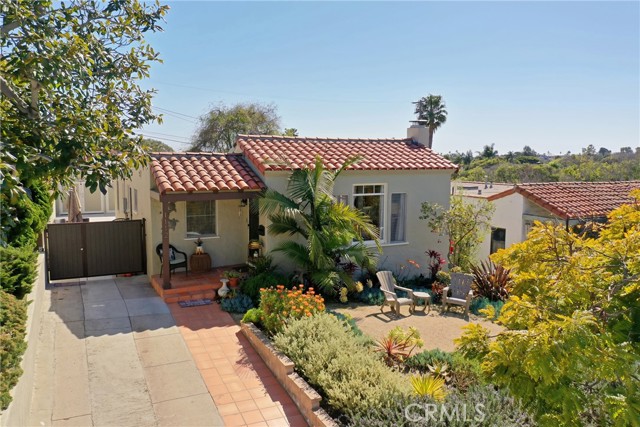 1112 Cedar Street Santa Monica, California Welcome home! Incredible location in Santa Monica's blissful Sunset Park. Surrounded by mature trees this home offers 3 bedrooms and 2 baths plus a detached spacious guest home. The main home is seamlessly charming and sophisticated with a sun kissed living room and generous dining area. Recently resurfaced original hardwood floors and a freshly painted exterior. Newly landscaped with irrigation as well as hardscaping including composite decking and a gas line for BBQ or fire pit. Sliding door leads to a cozy patio that is perfect for entertaining. Relax in your own spacious private backyard while watching the magical sunsets. The newly built guest house has vaulted ceilings and a large bathroom, plenty of windows for natural sunlight. This home is situated just minutes to restaurants, shopping, parks and the beach!