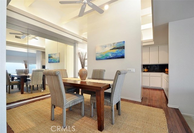 Formal Dining Area with Mirrored Wall to Reflect the Great View