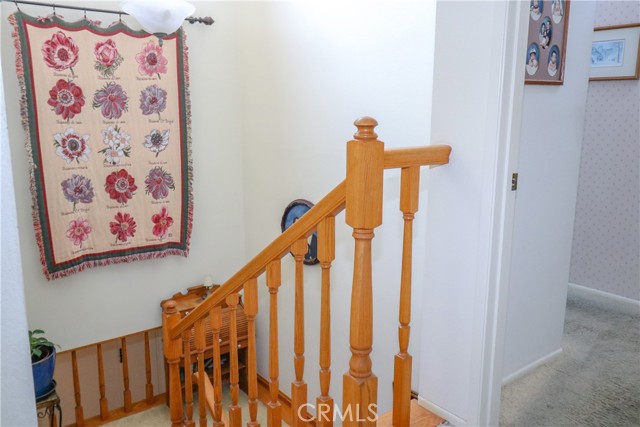 Upstairs looking at custom railing.