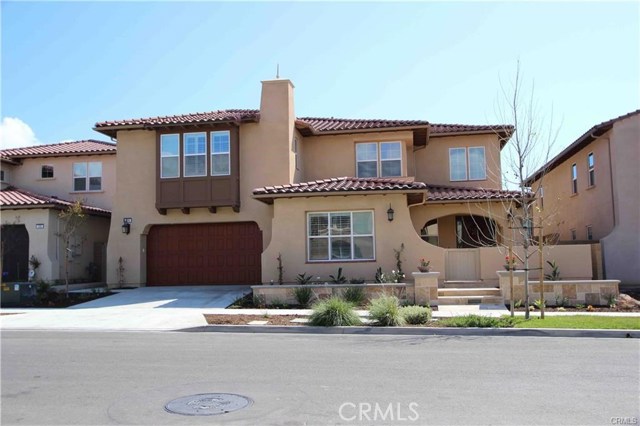 124 Cruiser Irvine, California Absolutely beautiful and luxurious, light and bright single family detached home!. Walking distance to the Beacon Park Elementary, the Great Park and many community pools and multiple children's parks, the best place to grow your family! Upon entry, soaring ceiling and a spiral stairway welcome you. The first floor features tile flooring, stainless steel appliances, 2 ample size kitchen island and sliding doors to the yard, extending your lifestyle to the backyard. There is one bedroom suite downstairs, convenient and private. Master bedroom and three other secondary rooms ensuite are on the second floor. The loft area on the 2nd floor can serve as a lounge. Huge Master bathroom includes a large walk-in closet, large shower room, spa-like bathtub, double vanity sink. Enjoy the newer appliances such as microwave, dishwasher, refrigerators, washer and dryer, and cooking ranges. Landscaping is beautifully done. The home is furnished, and most of the furnitures are just several month old. Tiles at the first floor, and carpet on the second floor. Walk to the nearby Beacon Park Elementary School.