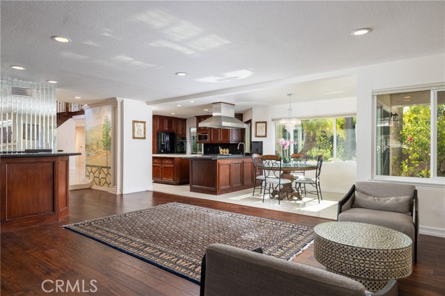 Casual eating area off the kitchen and open concept to the living room.