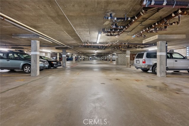 Subterranean Gated Parking Garage w/ Side By Side Parking Spaces