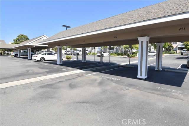 One car carport included plus plenty of guest parking. Note the free electric car power stations