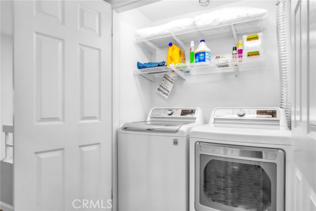 Laundry closet in bedroom hallway