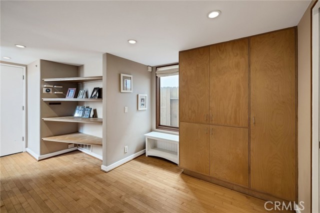 storage and shelving in downstairs hallway