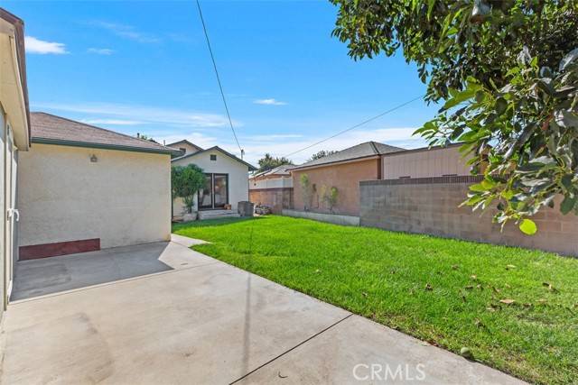 Backyard with 2 Car Garage and additional large storage shed all behind a private gate fence