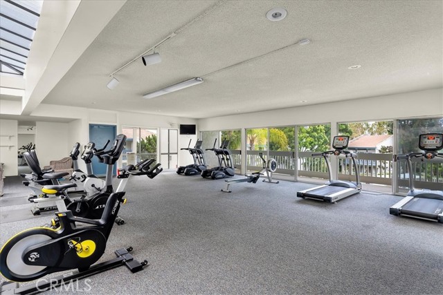 Cardio room overlooking pool