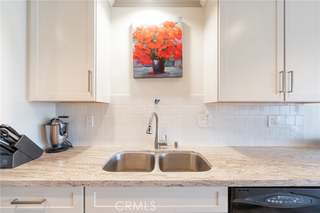 A comfortable sink area with a dishwasher