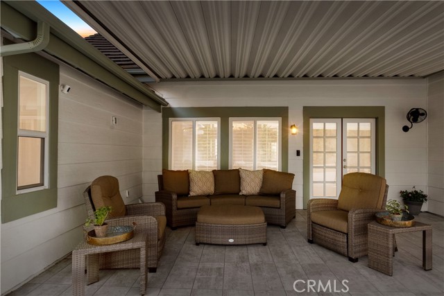 The perfect place to hang out rain or shine. You really can use the back patio area almost any day of the year. This easy maintenance tile will add beauty and elegance to your outdoor living experience.
