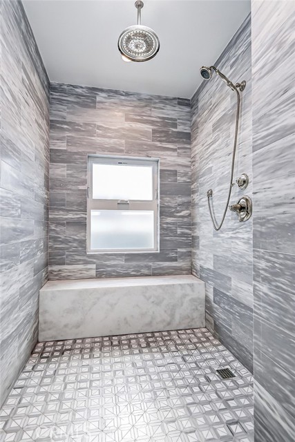 Sophisticated and Incredibly spacious upstairs shower!