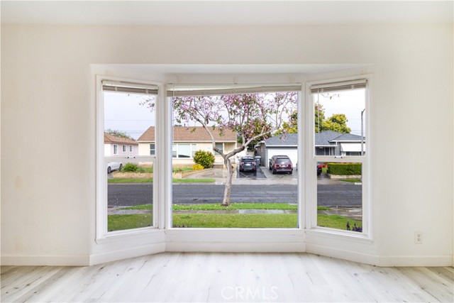 Front large bay window to tree lined street