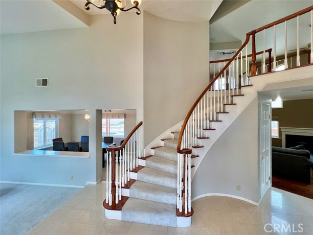 The Grand Staircase stuns as you enter the home!