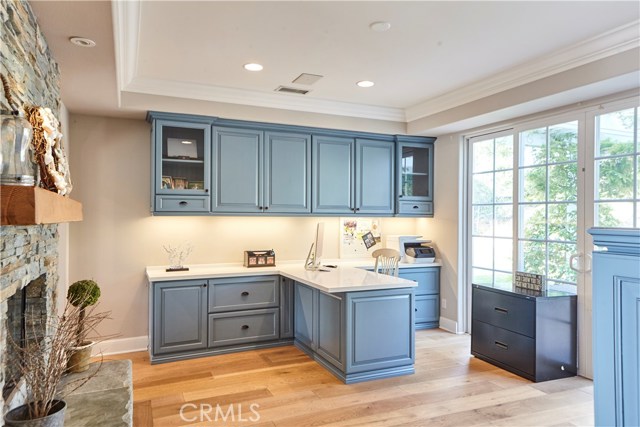 Over sized built in desk and storage cabinets