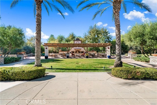 Solera Diamond Valley Exterior fireplace and sitting area.