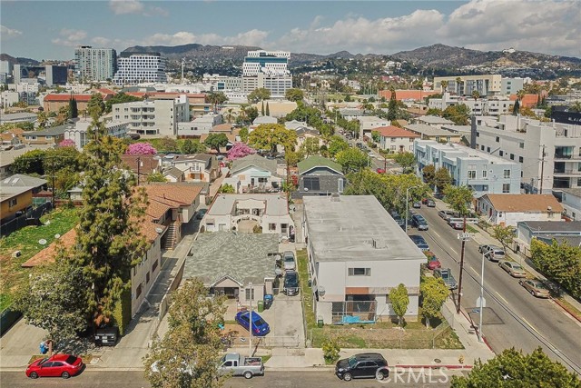 1163 N Van Ness Avenue Los Angeles, California There are two parcel next each other: 5807 Virginia Ave, Los Angeles, CA 90038-2005 with the APN#:5534-018-011 with lot size of 7500. sqft. has 3 units and 1163 N Van Ness Avenue has 6 units combined both lot for the total of 9 units, 7746 Living Sqft & 14,961 Sqft Lots.
Properties must be sold together, the combined land comes out to 14,961 square feet. This is a rare opportunity to find side by side lots on a corner. Buyer/Developer must confirm with the city of Los Angeles to determine the maximum number of units that can be built.
