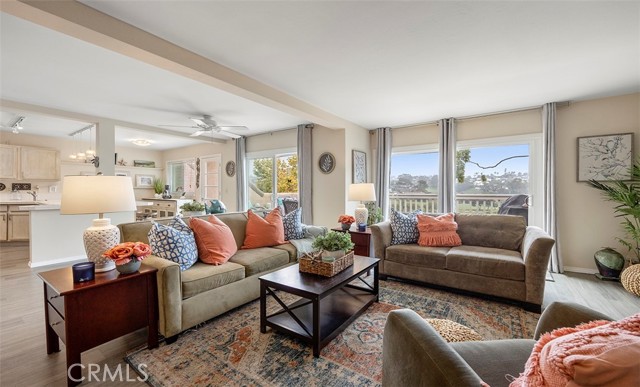 Living Room & Kitchen views to golf course.