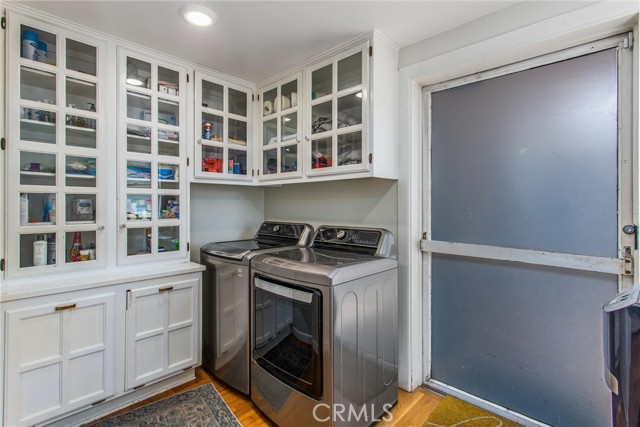 Laundry room Off Kitchen and door to the back yard and the Casita