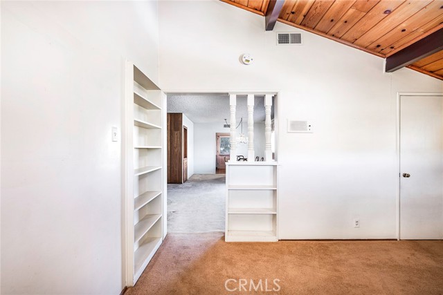 Looking from den into living/dining areas