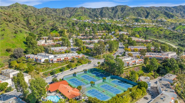 Presenting the large, premier unit in Cabrini with breathtaking views that you have been eagerly anticipating! The Cabrini Villas, nestled in the hills above Burbank and Sun Valley, offer a living experience to a luxury resort, boasting multiple tennis courts, pools, basketball and volleyball courts, as well as parks, a clubhouse, and a rec room. The amenities are truly endless!
The main level features a spacious living room/dining room with tiled flooring, recessed lighting, and elegant plantation shutters. The kitchen has been upgraded with custom high-end quality cabinets, quartz countertops, tile flooring, a drinking water filtration system, stainless steel appliances, and an island with seating for four. A sliding door opens to a generously sized fully tiled private patio, offering unparalleled mountain views across the park. Central air conditioning and heating ensure your comfort.
On the upper level, you will find three expansive bedrooms; the primary suite boasts the coveted views you have been yearning for. The remaining bedrooms share a remodeled full bath.
This tri-level residence includes a ground floor 2-car garage with direct unit access, epoxy flooring, side-by-side laundry hookups, and multiple built-in shelves for added storage capacity. Additionally, there is a 145+-square foot bonus room, currently utilized as an office, with installed cabinetry for your convenience. This versatile space could easily transform into a gym or extra storage room based on the preferences of the new owners.
This spacious townhouse is situated in a remarkable resort-style community. The HOA fees amount to $780 and encompass water, building insurance, 24-hour security, and an array of outstanding amenities: seven pools for residents to choose from, six tennis courts, a basketball court, a volleyball court, the exclusive Cabrini Park, a dog park, a recreation room/clubhouse, a children's playground, saunas, numerous guest parking spaces scattered throughout, and 24 hour security patrol. Don't miss out!!!