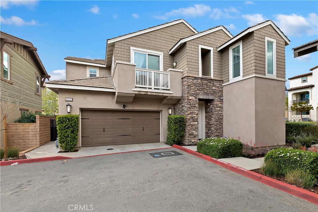 Welcome to 12222 Chorus Drive -- a detached, corner-unit home WITH A BEDROOM DOWN in the heart of Rancho Cucamonga’s desirable Day Creek Square community. Originally the model, this home blends modern design, thoughtful upgrades, and unbeatable convenience in a setting ideal for families and busy professionals alike. Inside, you’ll find an open-concept layout with tall ceilings and an abundance of natural light. The main living space features premium flooring and a seamless flow between the living room, dining area, and modern kitchen. Designed for both cooking and connection, the kitchen showcases upgraded shaker cabinets, quartz countertops, stainless steel appliances, and an oversized island with bar seating -- perfect for casual mornings or entertaining. Pre-wired for surround sound and finished with upscale touches throughout, this home offers comfort that feels a step above. A bedroom and full bath on the main level provide flexibility for guests, a home office, or multigenerational living. Upstairs, the primary suite is a retreat with its own spa-like bathroom featuring dual vanities, a soaking tub, separate shower, and a walk-in closet. Two additional bedrooms, a versatile loft, a laundry room, and a dual-vanity hall bath round out the second floor. Step outside to a beautifully landscaped backyard that feels like a private escape. And when you're ready for community fun, you're just around the corner from Day Creek Square’s resort-style amenities: a sparkling pool and spa, shaded lounge areas, a BBQ and picnic zone, bocce ball courts, and a tot lot. Tucked just minutes from Victoria Gardens, the 15 and 210 freeways, and a wide range of shopping, dining, and entertainment options, this home offers the perfect balance of lifestyle and location. Add in highly rated schools and low taxes, and you’ve got a rare opportunity to own one of the community’s most desirable homes.