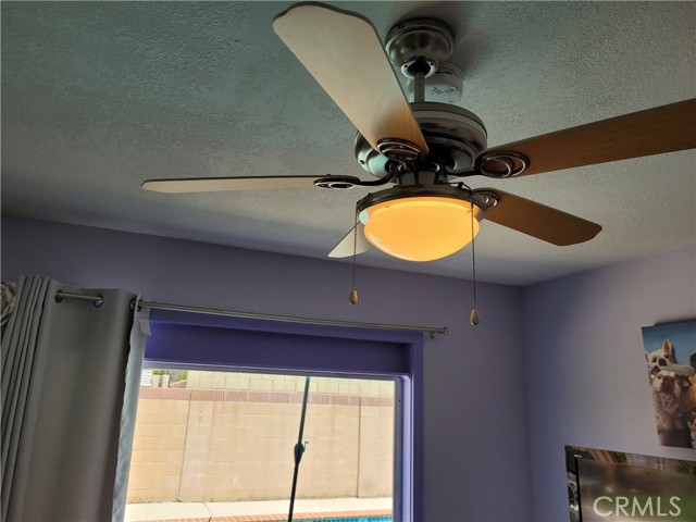 Ceiling fan at den.