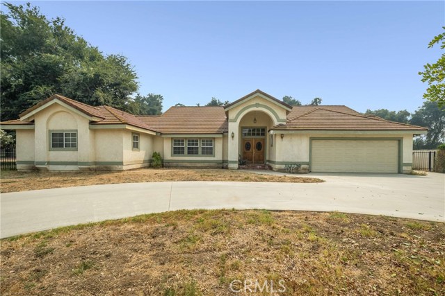 3510 E Holt Avenue West Covina, California This Spacious custom built home measuring at 2813 SQFT offers an open floor plan with abundant natural light throughout the home. The large master suite with dual sink areas and dual walk-in master closets, a separate soaking tub and shower and located at the far side of the home. The formal Living room offers an expansive window that looks out into the foothills. The family room has a brick fireplace and mantel with built-in bookshelves. The kitchen and breakfast area has french doors that lead to the rear yard. There is a formal dining area that has french doors that also lead you to the rear yard. The custom builder gave much thought and consideration when each of the rooms offer a french door or a large window to take in all of natures beauty.
Bring your imagination to this enormous flat lot that is just under a half-acre. There is room for a pool, RV parking, basketball court, and has 3 mature trees. Conveniently located near the 57 and 10 freeway.
