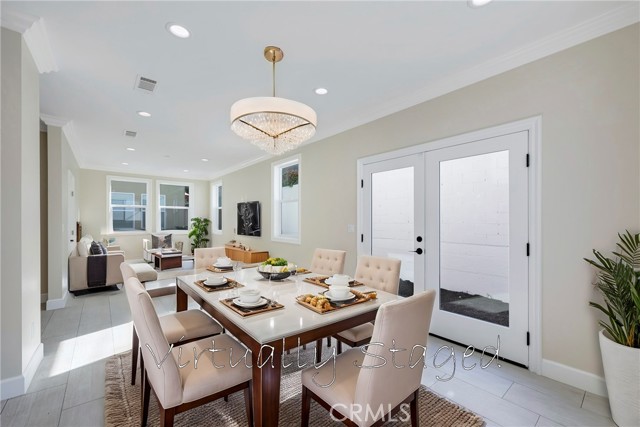 Virtually staged living room & dining room.