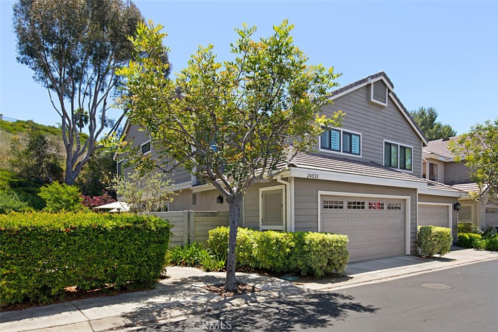 OCEAN CLOSE LAGUNA NIGUEL END UNIT ATTACHED HOME ON ONE SIDE ONLY WITH A HUGE WRAP-AROUND YARD THAT LOOKS OUT AT OPEN SPACE WITH NOBODY LIVING RIGHT BEHIND YOU WHICH GIVES YOU ADDED PEACE AND QUITE ALONG WITH SOME PRIVACY.
THE LARGEST FLOORPLAN IN THE TRACT FEATURING, APPROXIMATELY  1500+ SQUARE FEET OF LIVING SPACE REPLETE WITH 3 BEDROOMS, 2.50 BATHS, SEPARATE LIVING ROOM WITH VAULTED CEILINGS AND A FIREPLACE,FAMILY ROOM THAT OPENS UP TO THE KITCHEN,BOTH THE FAMILY ROOM AND THE LIVING ROOM HAVE A DOOR TO THE OUTSIDE LIVING AREA/YARD WHICH MAKES ENTERTAINING EASY PLUS A 2 CAR ATTACHED GARAGE WITH DIRECT ACCESS FROM THE KITCHEN AREA.
THE PROPERTY HAS BEEN PAMPERED BY THE CURRENT OWNER AND HAS MANY UPGRADES THAT MAKE IT STAND OUT OVER THE OTHERS IN THE COMMUNITY IN ADDITION TO BE BEING AN END UNIT WITH A LARGE YARD IT HAS NEWER DOUBLE PANE WINDOWS/SLIDER DOOR THAT MATCH THE EXTERIOR WITH A INNER WHITE FRAME FOR THE INTERIOR, ALSO A NEWER FRENCH DOOR THAT GOES FROM THE KITCHEN AREA TO THE OUTSIDE YARD,NEWER HVAC SYSTEM,NEWER HARD SURFACE FLOORING & CARPETING,UPGRADED LIGHTING FIXTURES,NEWER KITCHEN REFRESH WITH STAINLESS STEEL APPLIANCES,GRANITE COUNTER-TOPS AND AN UPDATED HALLWAY BATHROOM & POWDER ROOM,PLANTATION SHUTTERS,ROLL UP GARAGE DOOR WITH WINDOWS,SOME CROWN MOULDINGS,NEWER SINK FAUCETS. THIS IS PRETTY MUCH IN TURN-KEY CONDITION FOR COMFORTABLE LIVING IN LAGUNA NIGUEL.