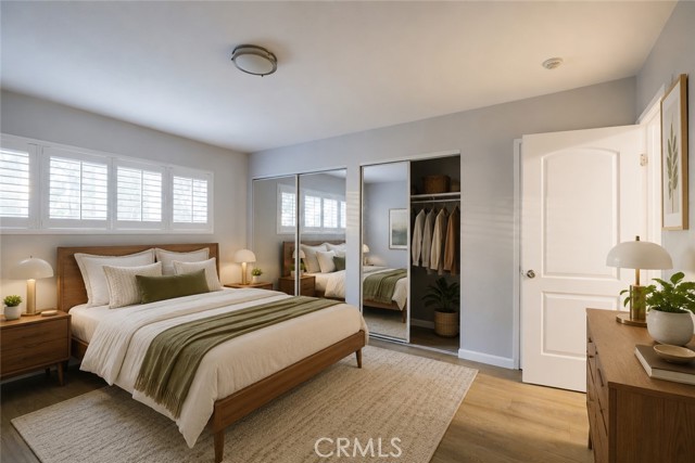Primary bedroom with ensuite bathroom, virtually staged