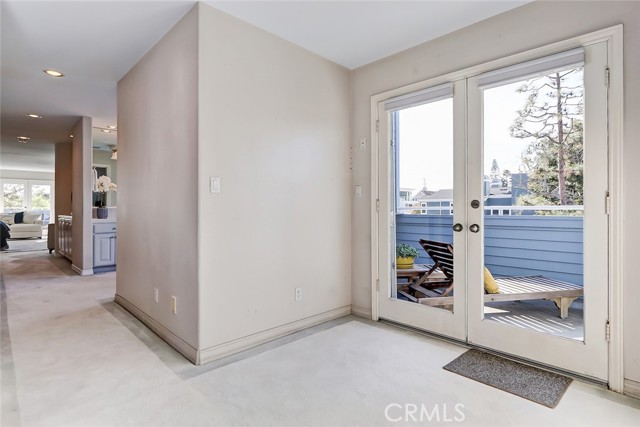 Master suite bathroom French doors lead to private deck