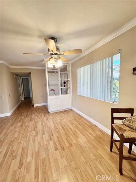 Open dining area featuring a built-in display case—perfect for showcasing décor, collectibles, or fine china
