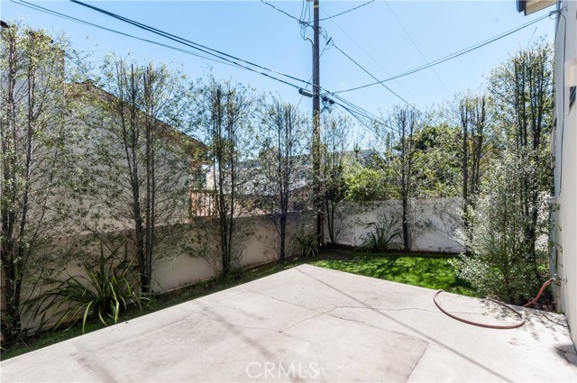 Concrete patio off family room.