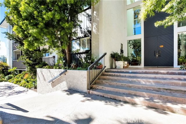 The Main Front Entry to the Building has Broad Steps and a Security System Ensuring Privacy and Safety.