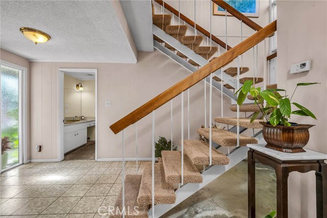 From entry looking towards downstairs master bedroom suite.