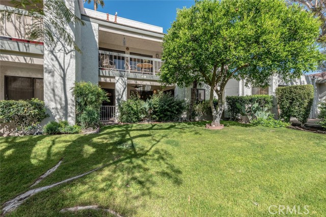 Highly sort after location with large green lawn area providing lots of space between buildings. Mature orange tree that has abundant fruit.