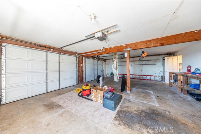 Oversized Garage As of the listing date, items in garage may stay for buyer's benefit.