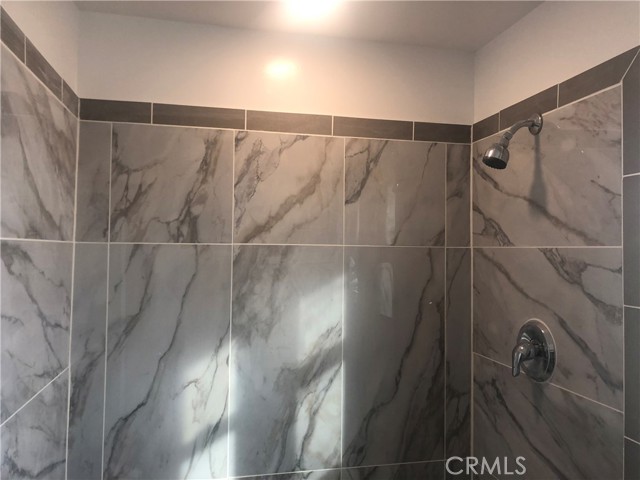 New tile in walk-in shower
