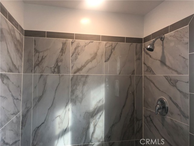 New tile in walk-in shower